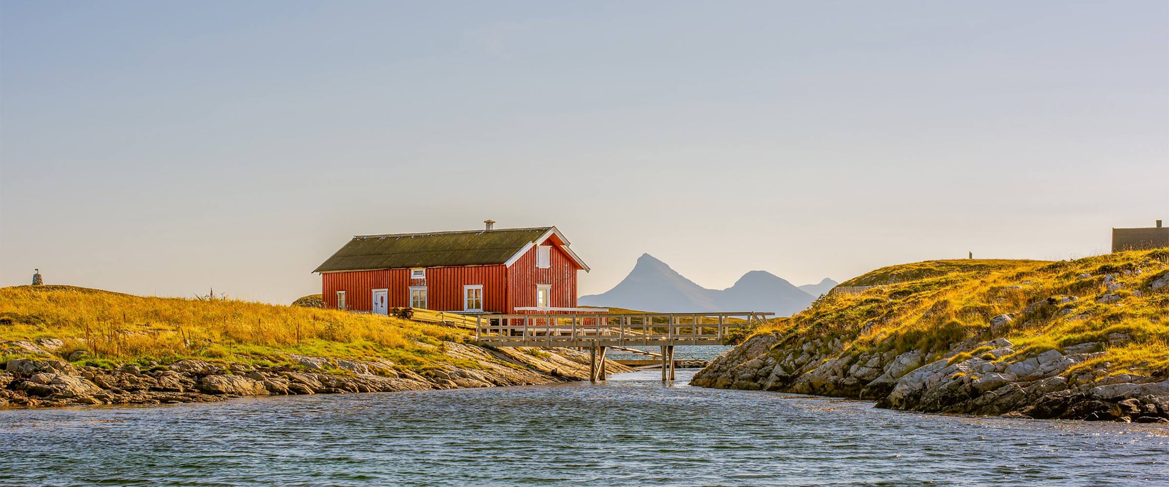 landscape with red house on near water